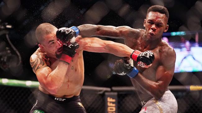 Robert Whittaker and Israel Adesanya during their title fight last year. Picture: AAP/Michael Dodge