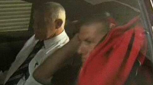 Iddles with Steven Bradley after his arrest. Picture: Channel 7