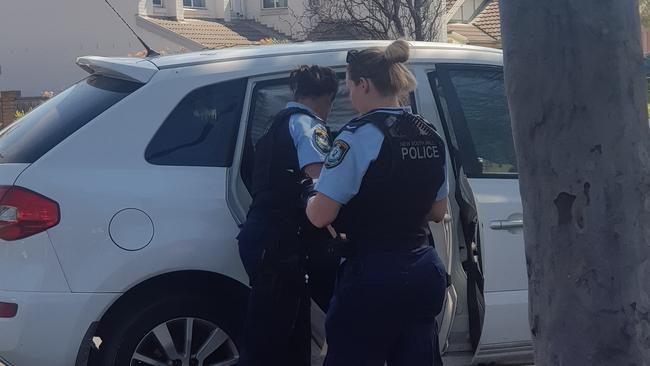 Police at the scene of a car crash at Quakers Hill. Picture: Sarah McKay