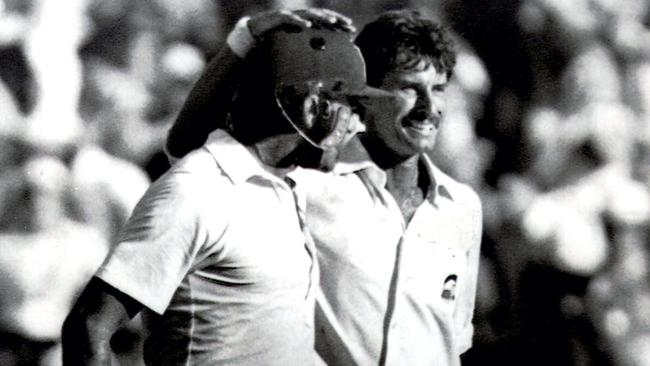 Champion New Zealand fast bowler Richard Hadlee congratulates Australia’s Michael Whitney on playing out his final over to ensure a draw in the 1987 MCG Test.