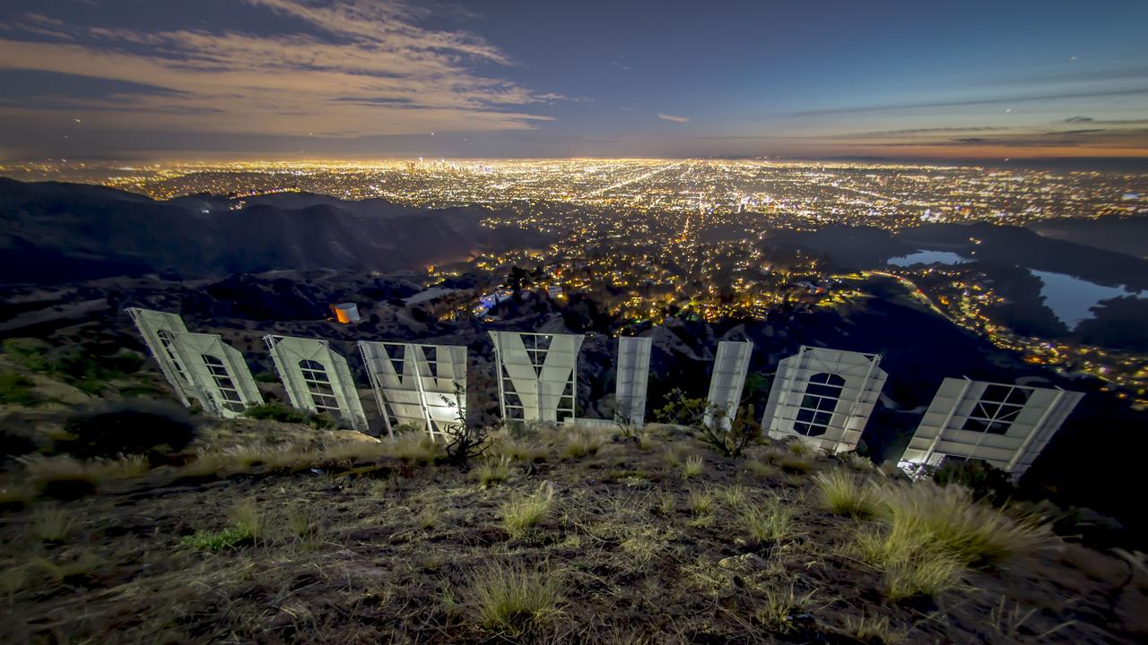 You can get within 30 metres of the sign from behind if hike to the top of Mount Lee, where the sign is located.