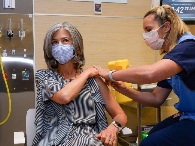 Nicola Spurrier gets her second Pfizer vaccine from Registered Nurse Tovah Green at the RAH, Monday March 15, 2021. Picture: Brenton Edwards