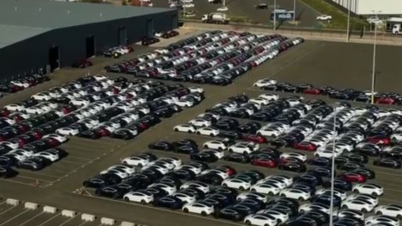 Picture shows Tesla ‘graveyard’ as unsold cars pile up in Australia ...