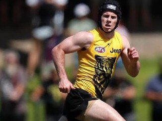 Jack Higgins trains in a helmet on the Gold Coast. Picture: Richmond Instagram