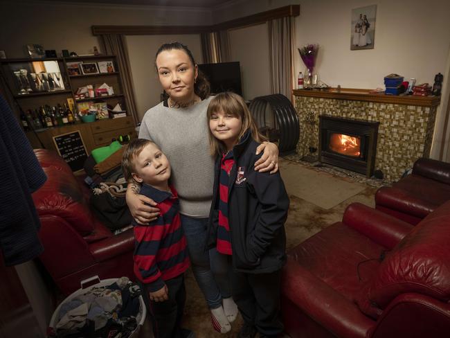 Ellanah Burness with her children Izaak Nichols, 5, and Keira Wilson, 9, in their private rental at Claremont. Picture: Chris Kidd