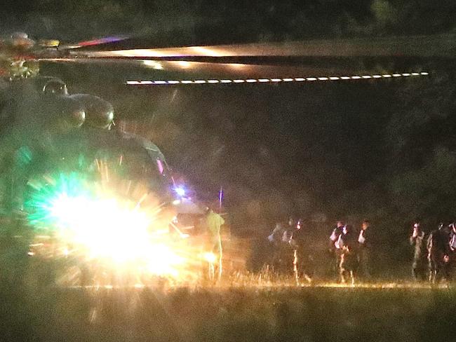 Medics evacuate the first two children via helicopter after they were rescued from Tham Luang cave before heading to hospital. Picture: EPA