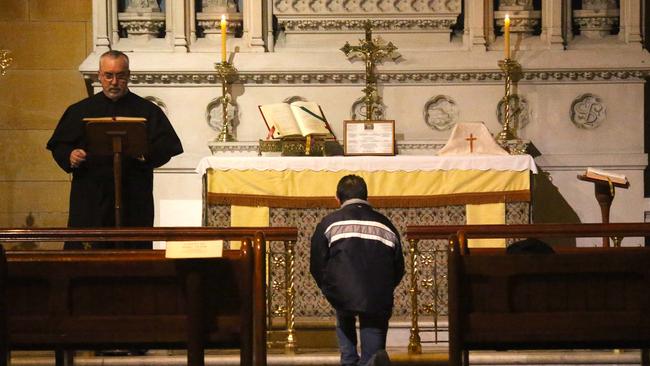 After closing their doors to worshippers in March, Catholic churches in NSW will reopen on Friday for private prayer, confession and small-scale masses. St Mary’s Cathedral in Sydney’s CBD opened at 6.30am with the first of four masses held at 7am. Picture: Matrix News