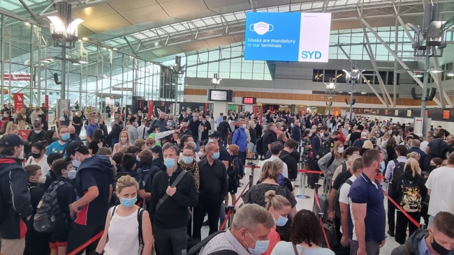 Frustrated passengers wait in long queues on Monday at Sydney Airport. Picture: Facebook.