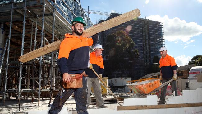 Tony El Wede, Adam Marogy and Ash Ezria pictured at a building site in Carlingford. Data shows unemployment at its lowest level for a decade in Western Sydney. Picture: Richard Dobson