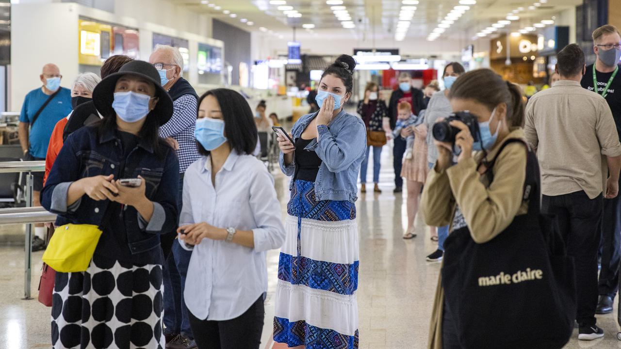 Passengers swarmed Sydney International Airport on day one of the trans-Tasman travel bubble opening. Picture: Jenny Evans/Getty Images.