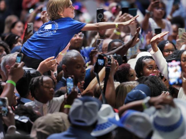 Kamala Harris, mobbed by supporters at a rally in Savannah, Georgia, has raised record-breaking sums from donors — without, critics say, offering any firm opinions on big issues. Picture: Win McNamee/Getty Images/WSJ