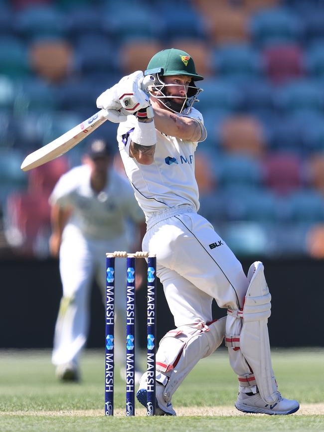 Tigers batsman Matthew Wade smacks a boundary on day four of the Sheffield Shield match between Tasmania and Victoria at Blundstone Arena. Picture: AAP