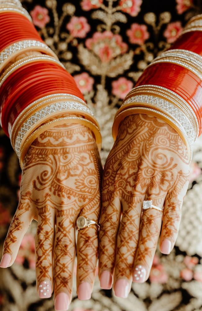 The henna and red and gold bangles that Pria Puri wore for her wedding. Picture Rach Martin Photography