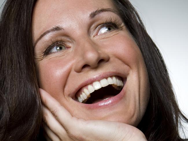 Woman laughing, close-up