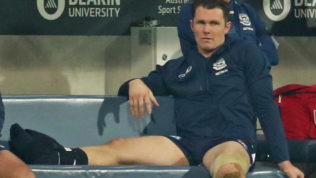 Patrick Dangerfield ices his ankle during the last quarter of Geelong’s win over Western Bulldogs. Picture: Getty Images