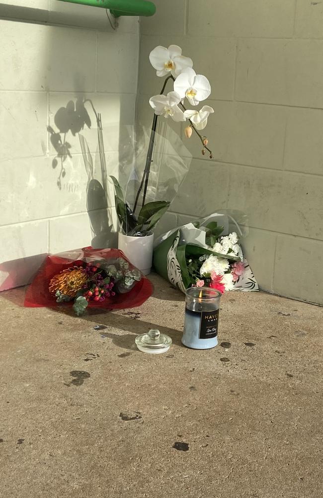 The growing memorial outside the Moulden Supermarket where a boy, 11, was struck and killed by a car in the carpark on Tuesday, December 20, 2022. Picture: Riley Walter