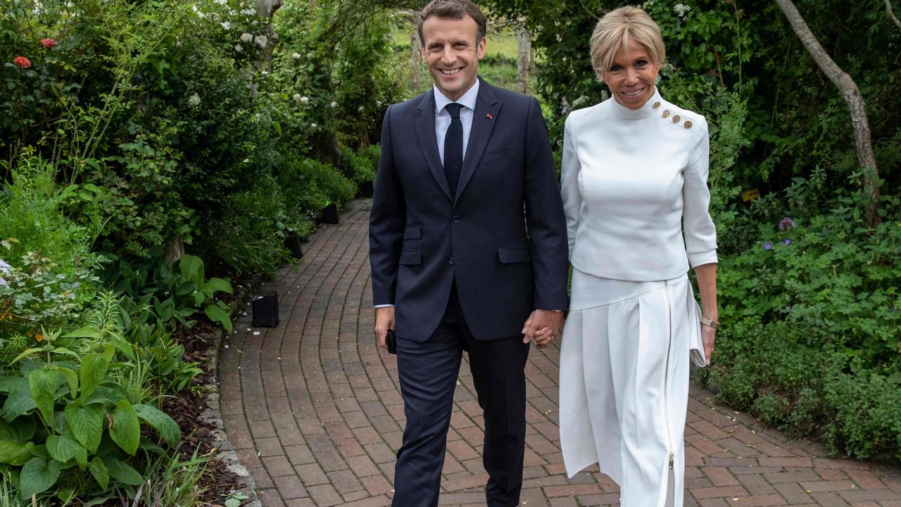 Emmanuel with his wife Brigitte, who was once his teacher in high school, which is fine and normal. Picture: Jack Hill/AFP