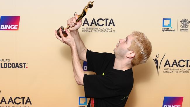 Danny Philippou poses with the AACTA Award for Best Screenplay in Film for Talk to Me during the 2024 AACTA Industry Awards. Picture: Chris Hyde/Getty Images