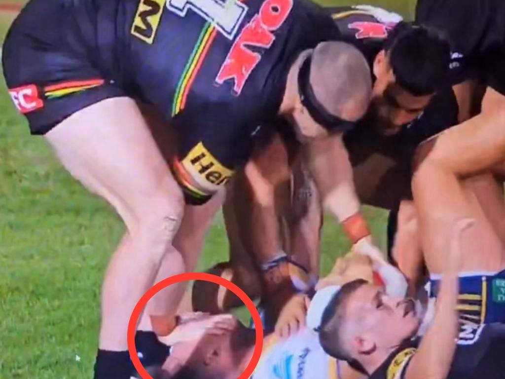 Dylan Edwards gives Bryce Cartwright a going over. Picture: Fox League