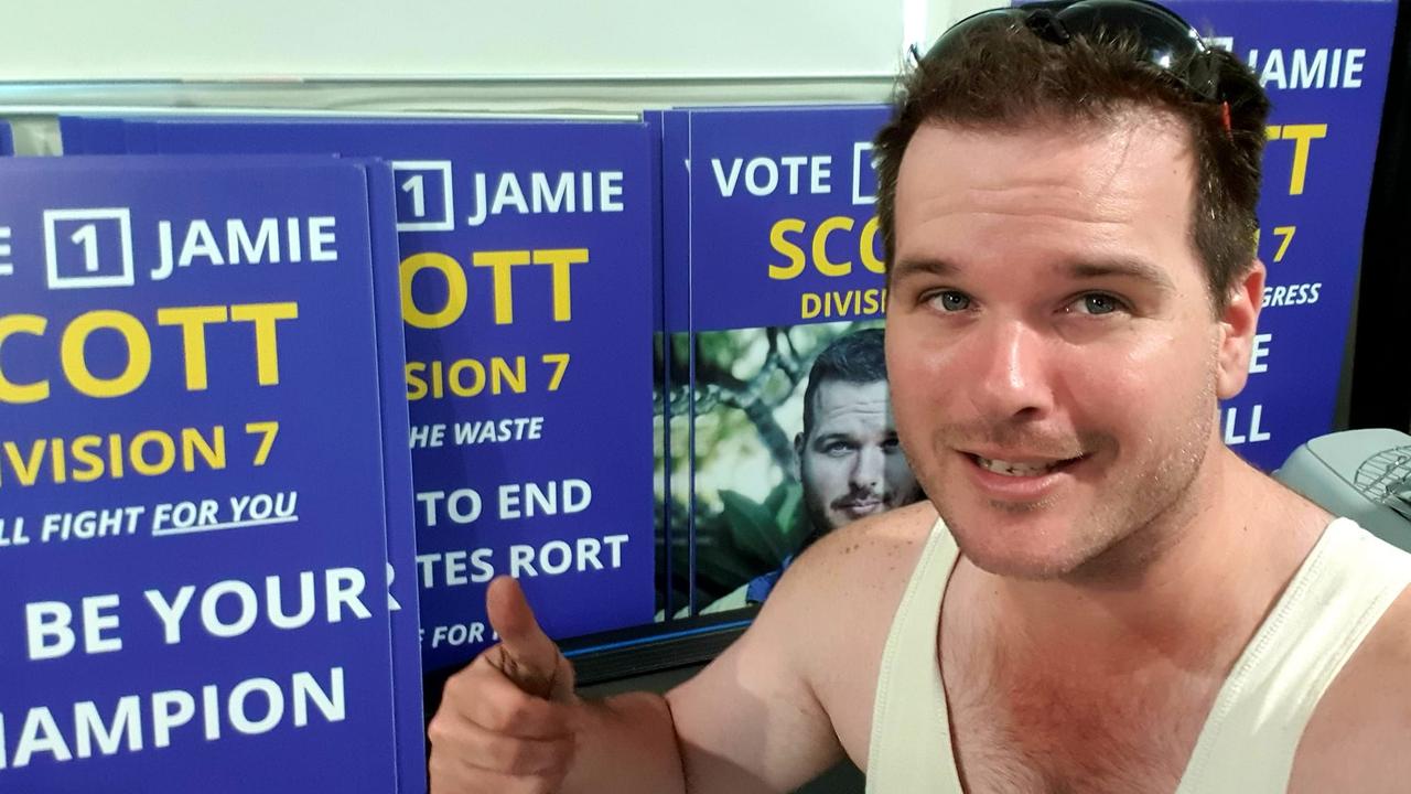 Jamie Scott with his election campaign signs to run for division 7 with Rockhampton Regional Council.