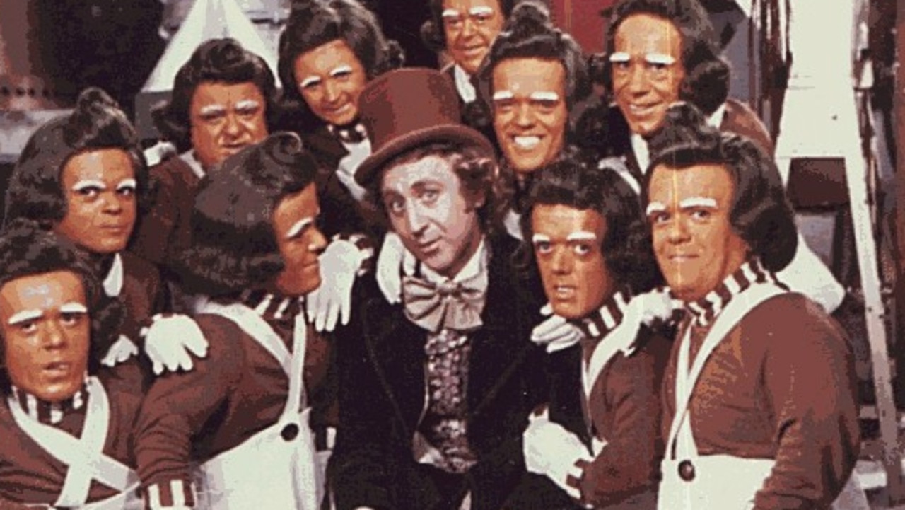 Gene Wilder as Willy Wonka and the Oompa Loompas from the film "Charlie and The Chocolate Factory".