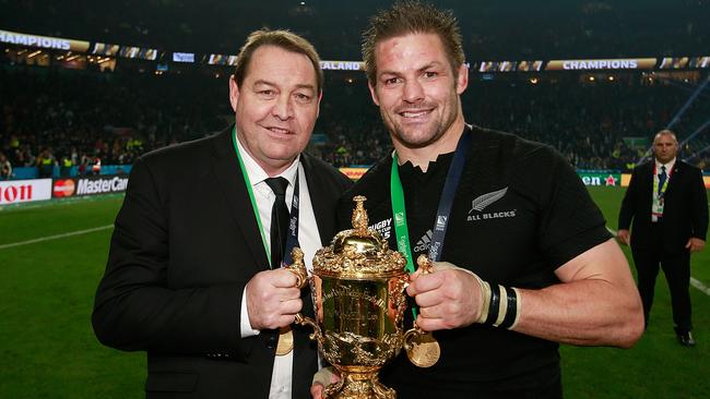 Steve Hansen and Richie McCaw pose with the Webb Ellis Cup after winning the 2015 Rugby World Cup Final. Picture: Getty Images