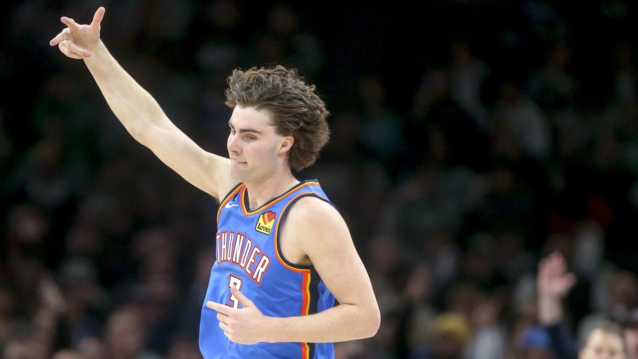 OKLAHOMA CITY, OKLAHOMA - JANUARY 03: Josh Giddey #3 of the Oklahoma City Thunder celebrates after making a three point basket during the third quarter against the Boston Celtics at Paycom Center on January 03, 2023 in Oklahoma City, Oklahoma. NOTE TO USER: User expressly acknowledges and agrees that, by downloading and or using this photograph, User is consenting to the terms and conditions of the Getty Images License Agreement. (Photo by Ian Maule/Getty Images)
