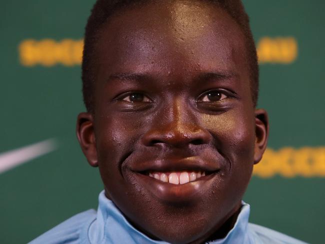 SYDNEY, AUSTRALIA - SEPTEMBER 14: Player Garang Kuol speaks with the media during a Socceroos squad announcement and press conference at Dexus Place on September 14, 2022 in Sydney, Australia. (Photo by Lisa Maree Williams/Getty Images)