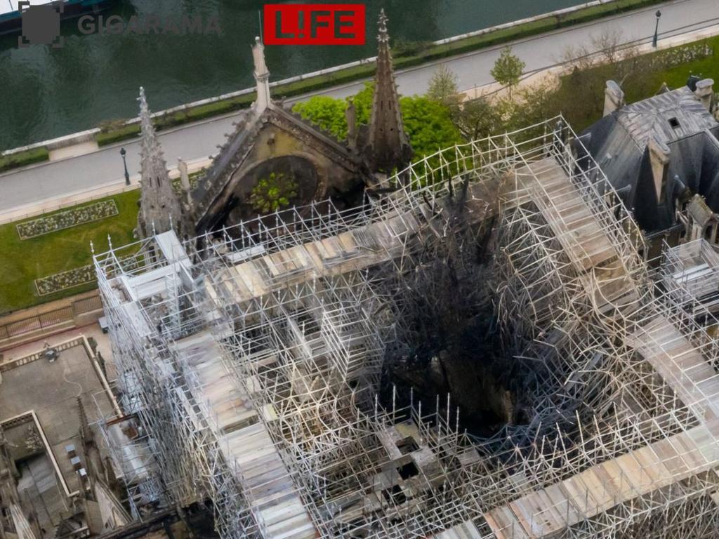 Fire damage seen in the centre of the cathedral’s scaffolding. Picture: Gigarama