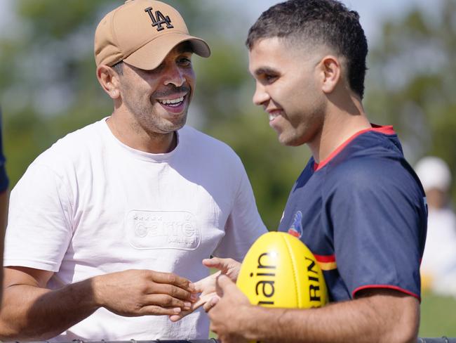 Eddie Betts catches up with former teammate Tyson Stengle. Picture: AAP/Michael Dodge