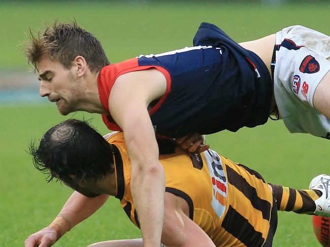 AFL Round 11 : Hawthorn v Melbourne Dom Tyson over the top of Jordan Lewis 3rd term Picture:Wayne Ludbey