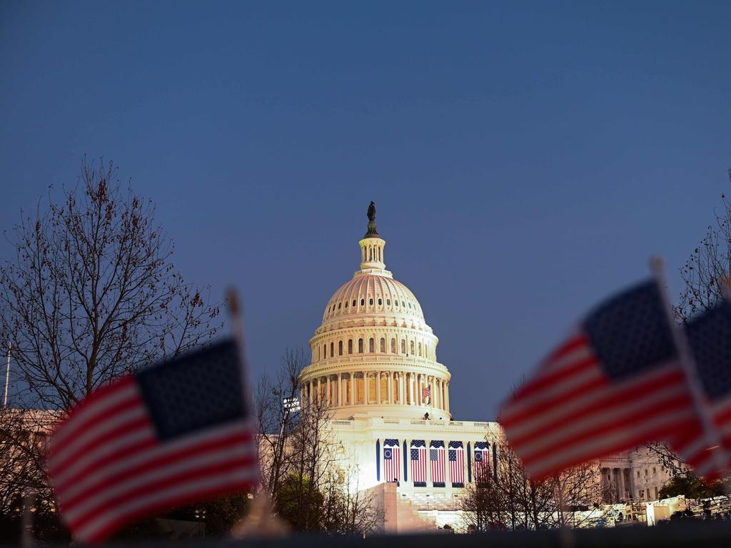 US flags can be seen near the Capitol Building in Washington, DC on January 19, 2021, ahead of the 59th inaugural ceremony for President-elect Joe Biden and Vice President-elect Kamala Harris. Picture: AFP