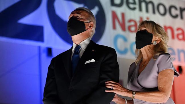 Joe and Jill Biden wear face masks at the conclusion of the Democratic National Convention, which was held virtually amid the pandemic. Picture: Olivier Douliery/AFP