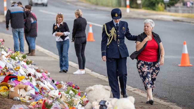 Mourners pay tribute to the children who died after gust of wind swept away a jumping castle at Hillcrest Primary School Devonport Tasmania. Picture: Jason Edwards