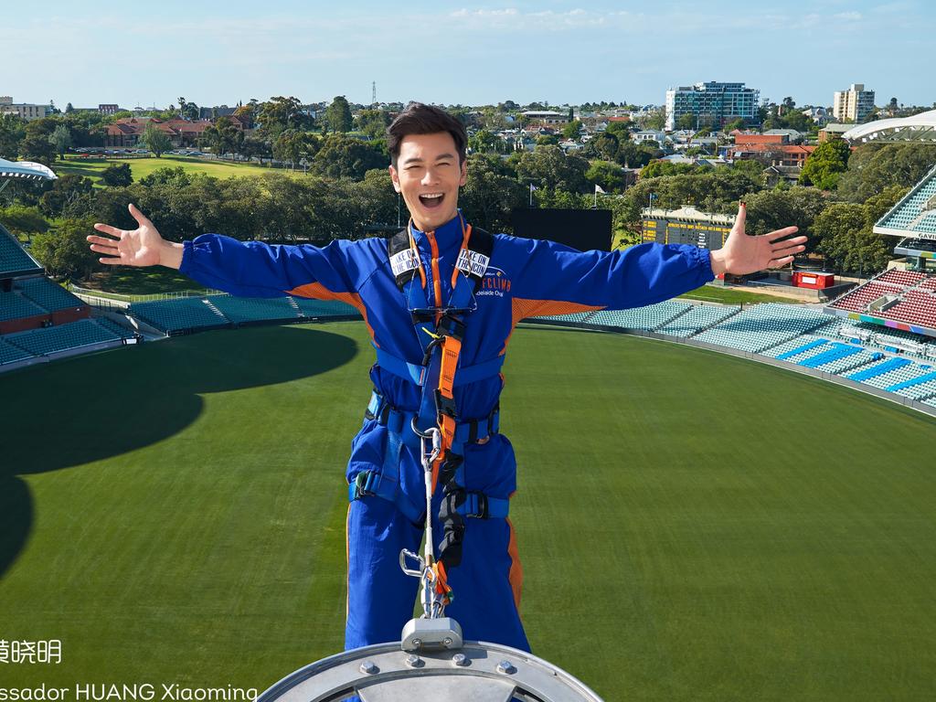 Huang Xiaoming climbs the roof of Adelaide Oval. Picture: South Australian Tourism Commission