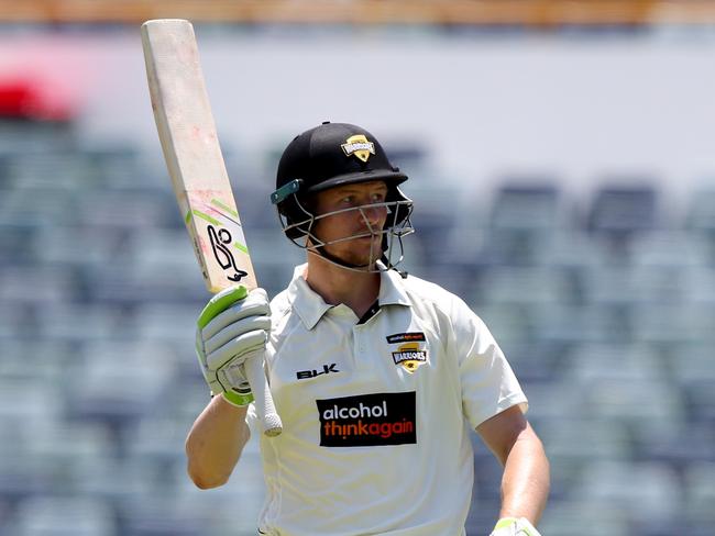 Cameron Bancroft salutes after his half century.