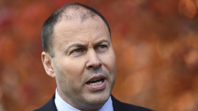 Australian Minister for the Environment and Energy Josh Frydenberg speaks to the media during a press conference at Parliament House in Canberra, Monday, May 21, 2018. AGL announced on Monday it had knocked back the purchase request from Alinta Energy to buy the Liddell power station for  $250 million because it wasn't in its best interests, despite government pressure. (AAP Image/Lukas Coch) NO ARCHIVING