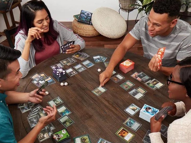 A game of Magic: The Gathering at a home table. Picture: Wizards of the Coast