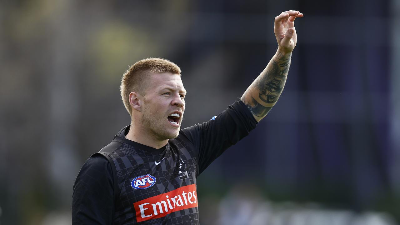 MELBOURNE, AUSTRALIA - SEPTEMBER 15: Jordan De Goey of the Magpies reacts during a Collingwood Magpies AFL training session at Olympic Park Oval on September 15, 2022 in Melbourne, Australia. (Photo by Daniel Pockett/Getty Images)