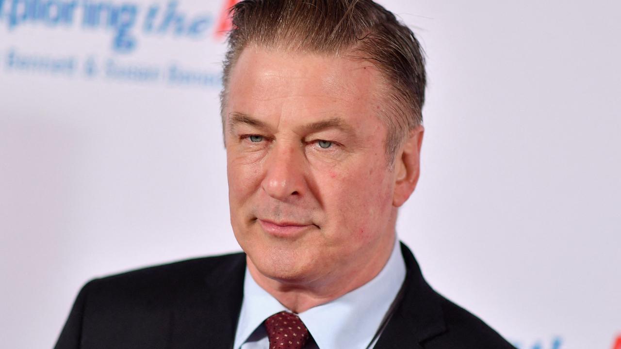 Actor Alec Baldwin and the other producers of the film Rust have settled with the family of cinematographer Halyna Hutchins who died after being hit by a live round that came from a gun Baldwin was holding. (Photo by Angela Weiss / AFP)