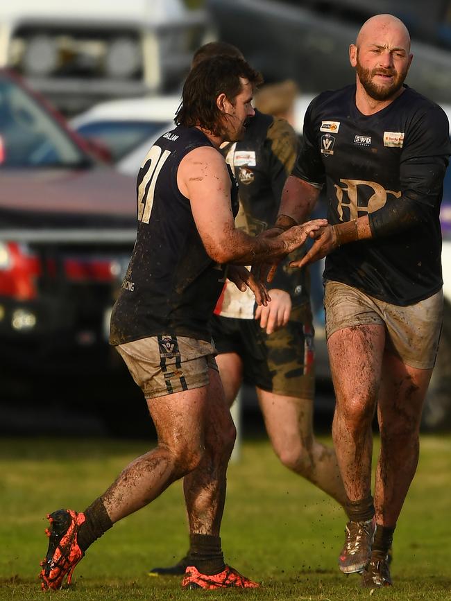 Harley Bongart of Ballan is congratulated by teammates. Picture: Josh Chadwick