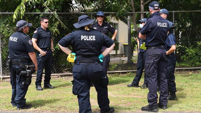 Police gather a street away from where an alleged police shooting of a young Aboriginal man happen in Palmerston suburb of Gray. Picture: (A)manda Parkinson