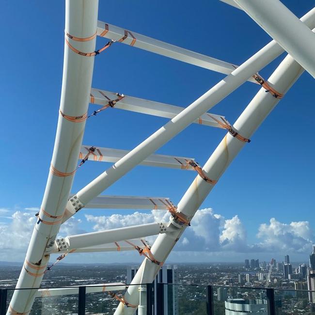 Ratchet straps covering a structure on top of The Oracle Hinterland Tower at Broadbeach in December 2020.