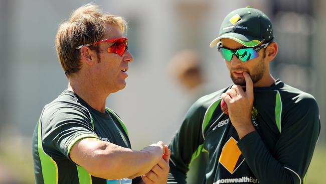 The pressure had dropped a bit for Nathan Lyon (right) because he was playing well after Shane Warne (left) retired. Picture: Morne de Klerk/Getty Images