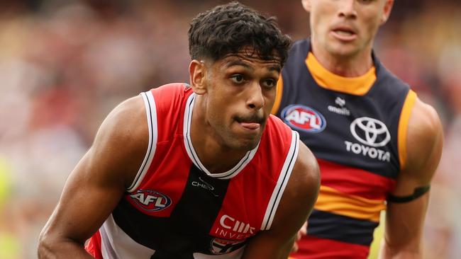 ADELAIDE, AUSTRALIA - MARCH 16: Nasiah Wanganeen-Milera of the Saints is tackled by Ben Keays of the Crows during the 2025 AFL Round 01 match between the Adelaide Crows and the St Kilda Saints at Adelaide Oval on March 16, 2025 in Adelaide, Australia. (Photo by James Elsby/AFL Photos via Getty Images)