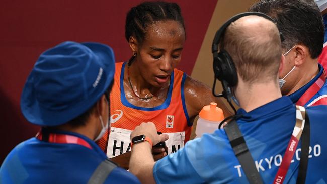 Tastes like gold: Netherlands' Sifan Hassan drinks water after winning the women's 10,000m final. Picture: Ina Fassbender/AFP