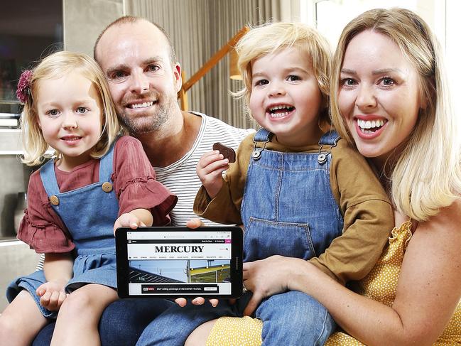 Simon Kemp and wife  Brierlie Godfrey-Kemp of Sandy Bay enjoy the 28 day free Mercury subscription whilst at home with kids Scarlett, 4 and Hunter, 2.  Picture: Zak Simmonds