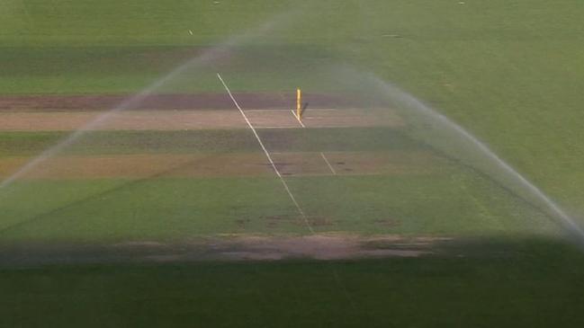 The sprinklers didn't the memo that a cricket game was about to start.