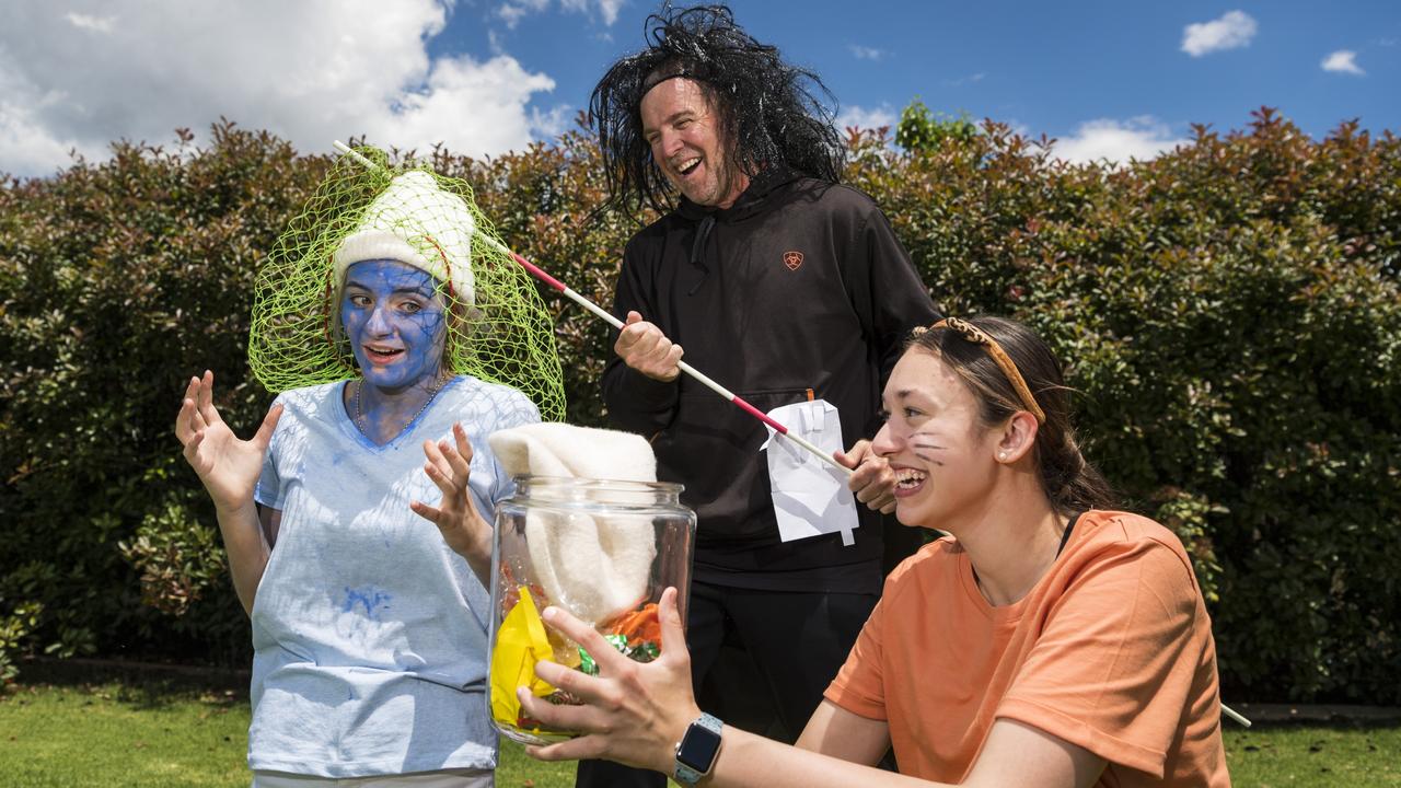 The CSW pastoral care group dressed up as characters from The Smurf's (from left) Jasmine Stewart, teacher Cameron Williams and Annie Seeto as St Ursula's College students dressed up for their boat race during St Ursula's Week, Wednesday, October 20, 2021. Picture: Kevin Farmer