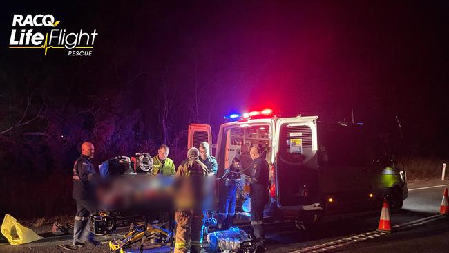 An off-duty paramedic, local QAS and rescue helicopter crew treated the man after a single vehicle crash in the Gladstone region.